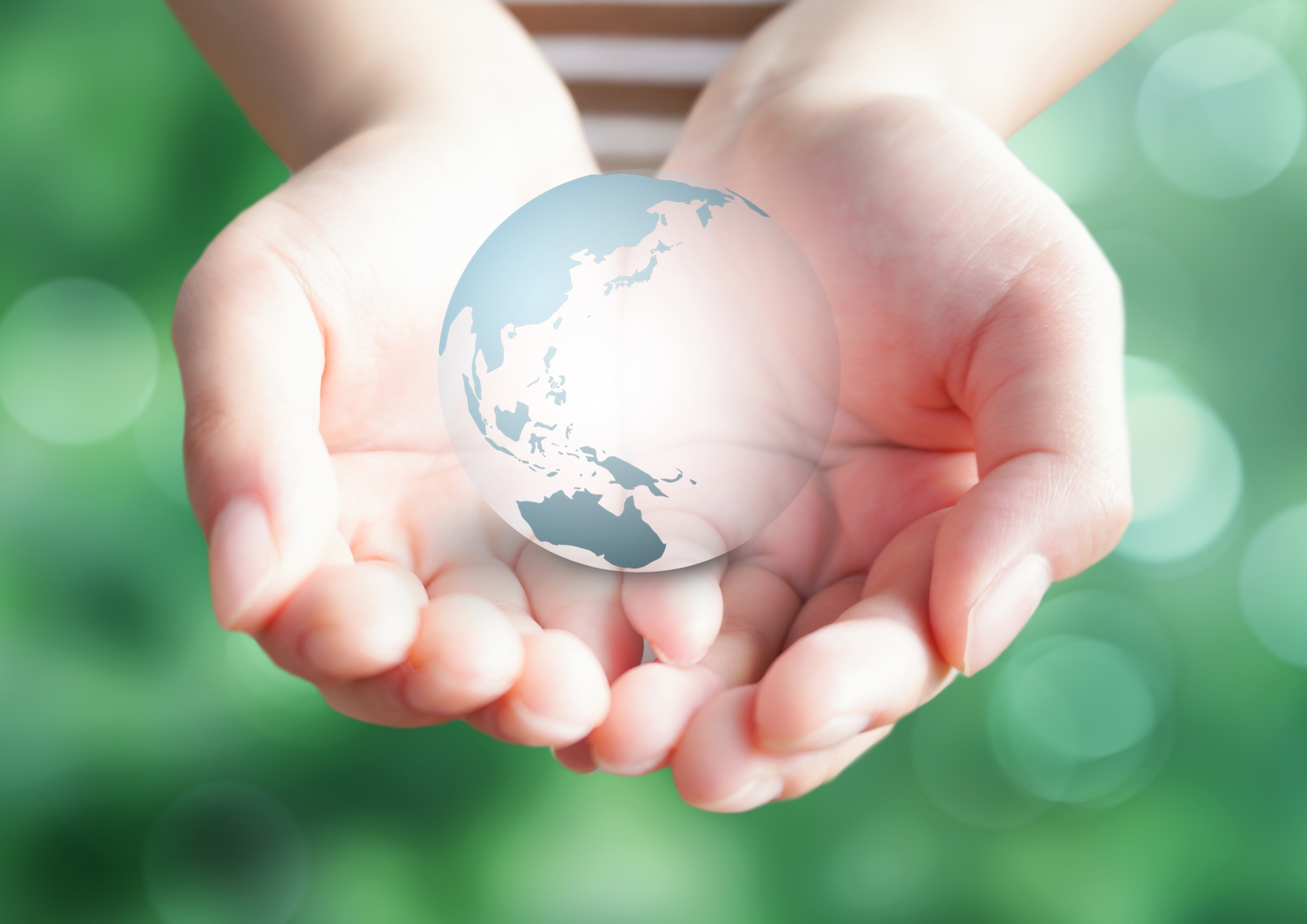 手に地球