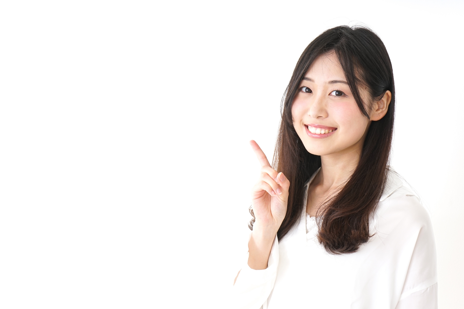 人差し指を立てている女性